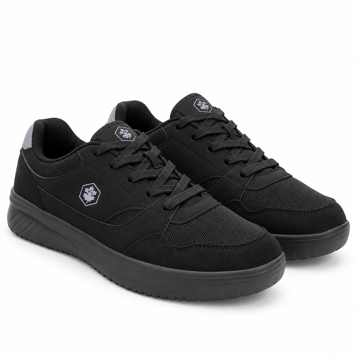 A pair of black low-top athletic sneakers with a textured mesh and suede upper, black laces, and a thick black sole, shown on a white background.
