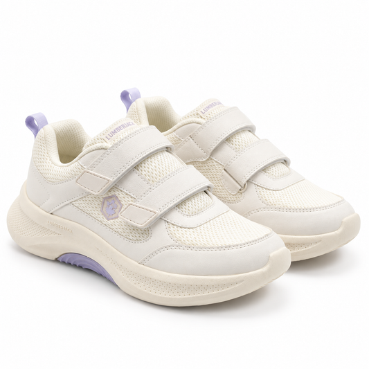 A pair of women's white sneakers with purple accents, featuring two hook-and-loop straps and a thick cushioned sole, shown on a white background.