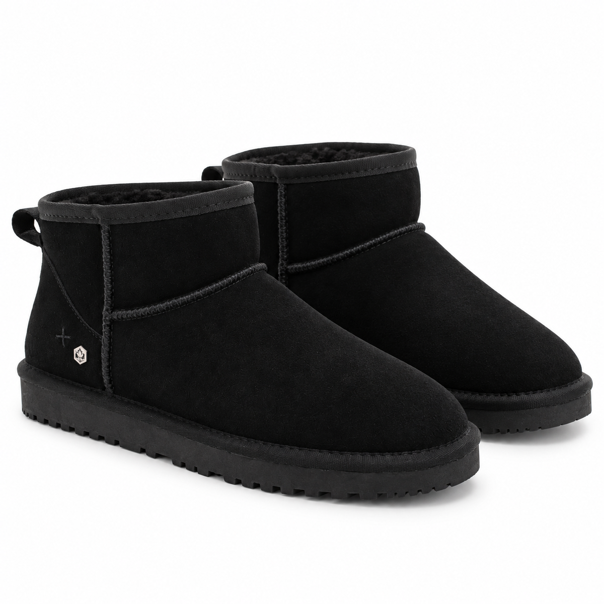 A pair of black suede ankle boots with black faux-leather trim and thick black soles, shown on a clean white background.